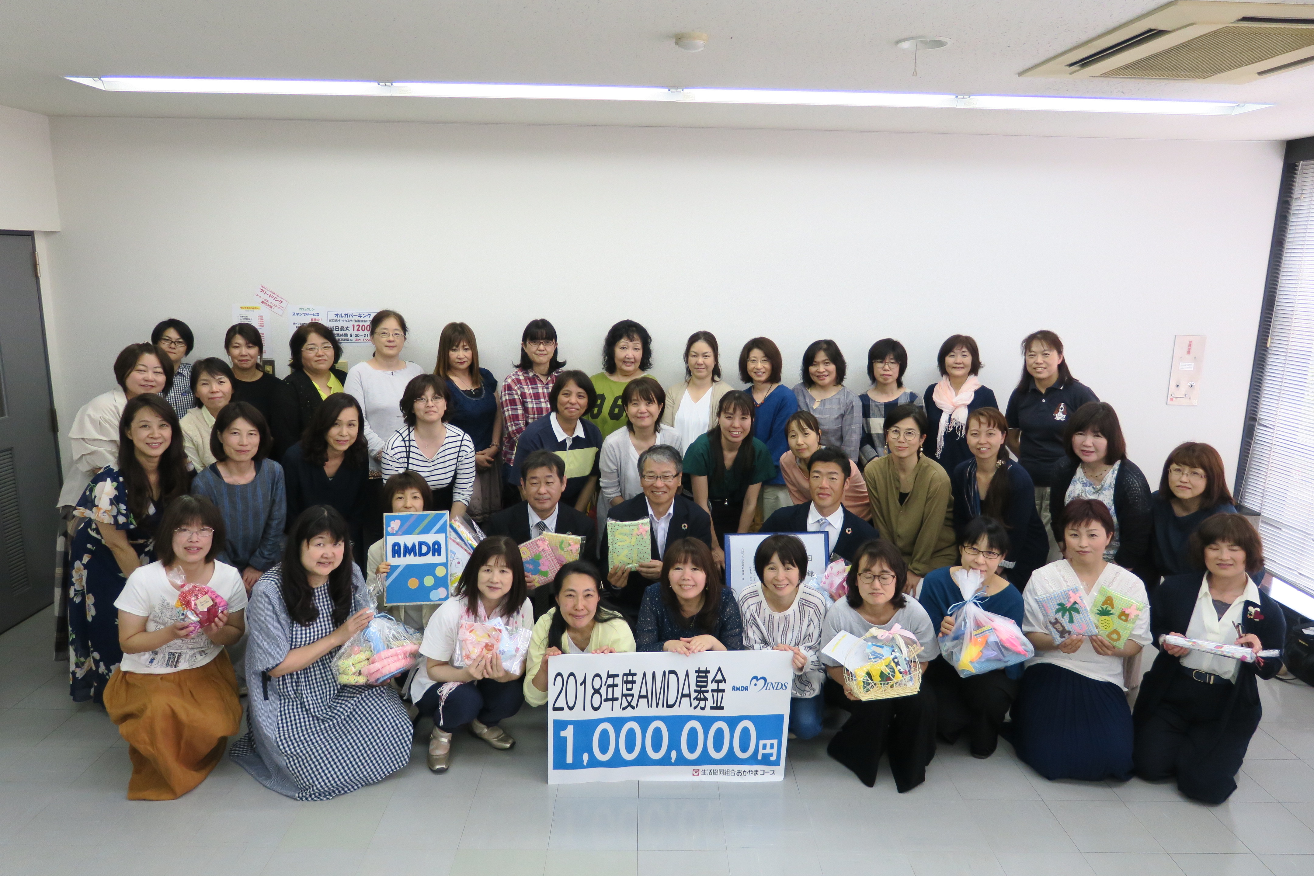 Okayama Co-op presents 1 Million JPY to AMDA-MINDS
